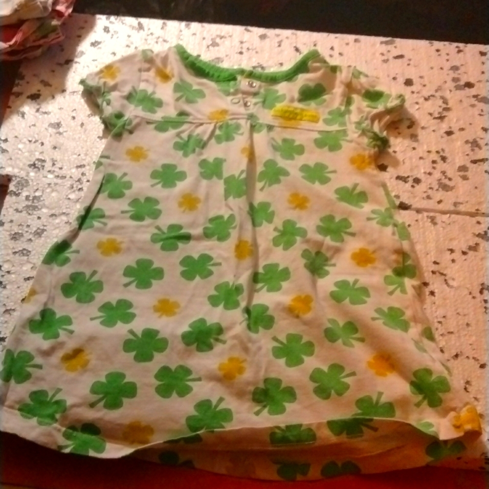 White dress 24 months with green and gold clovers